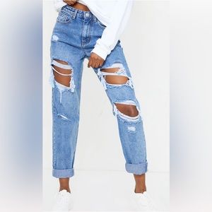 Pretty little thing mid blue distressed mom Jean size 10(US)